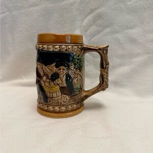 Vintage Ceramic Beer Stein with Intricate Design